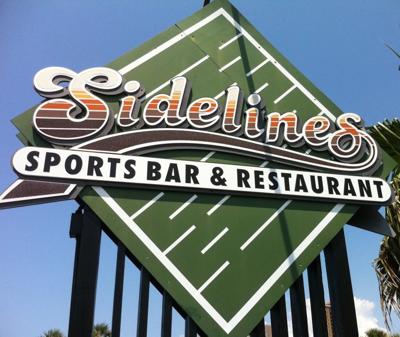 Sidelines Sports Bar and Restaurant Palm trees in Sunset Pensacola Beach